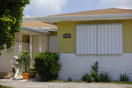 Gulf coast hurricane shutters