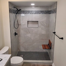 Tub to shower conversion